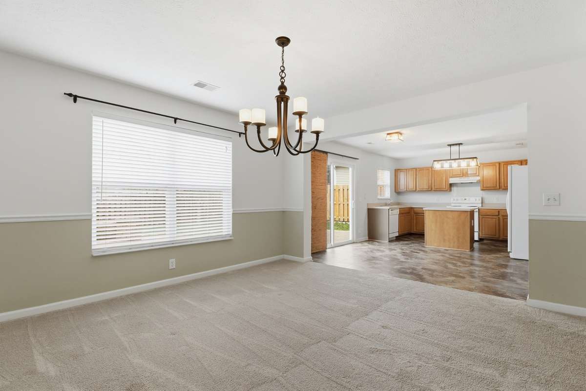 The Formal Dining is just off the Kitchen and Breakfast nook. Featuring a newer light fixture
