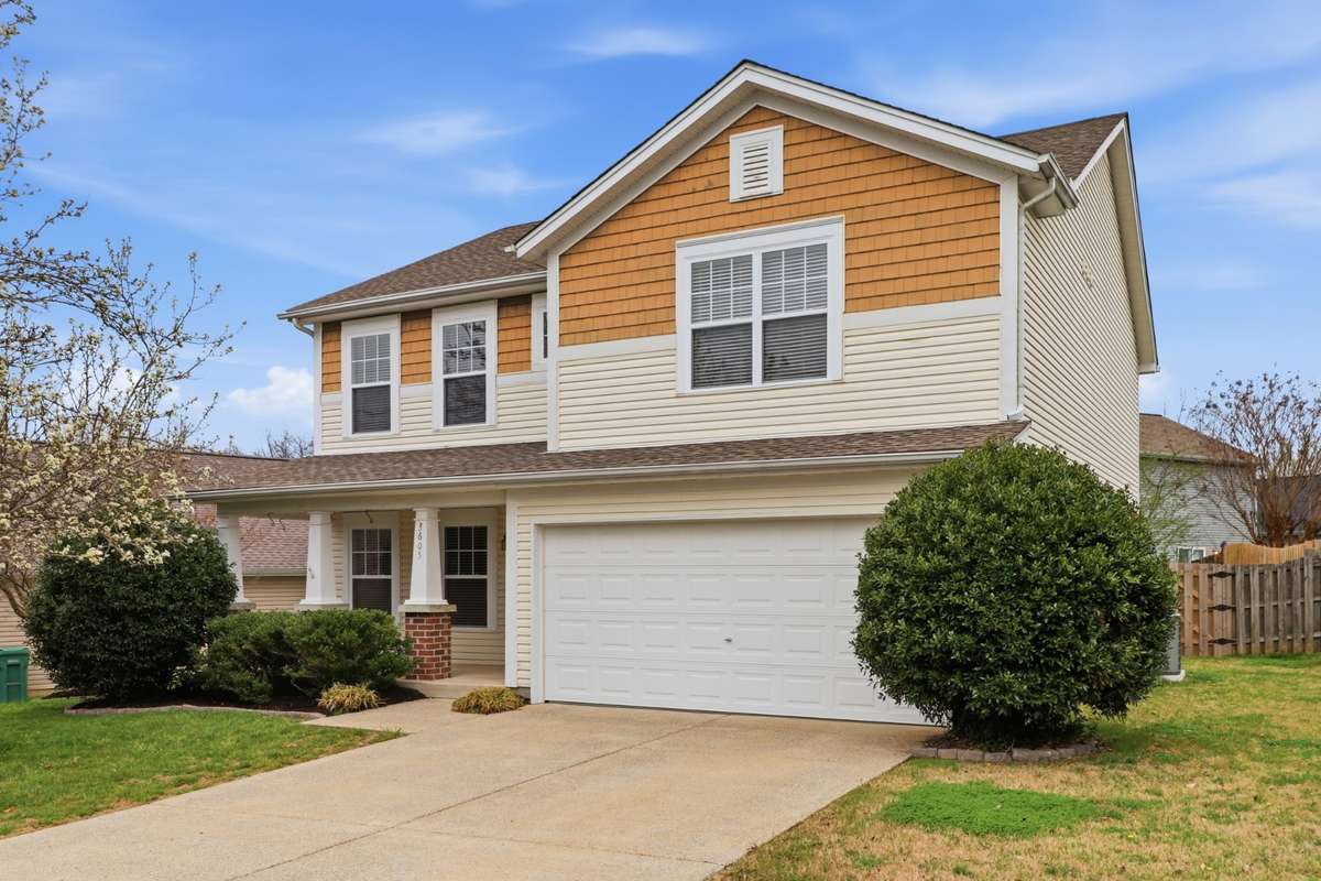 This home features a 2 car attached garage and concrete driveway