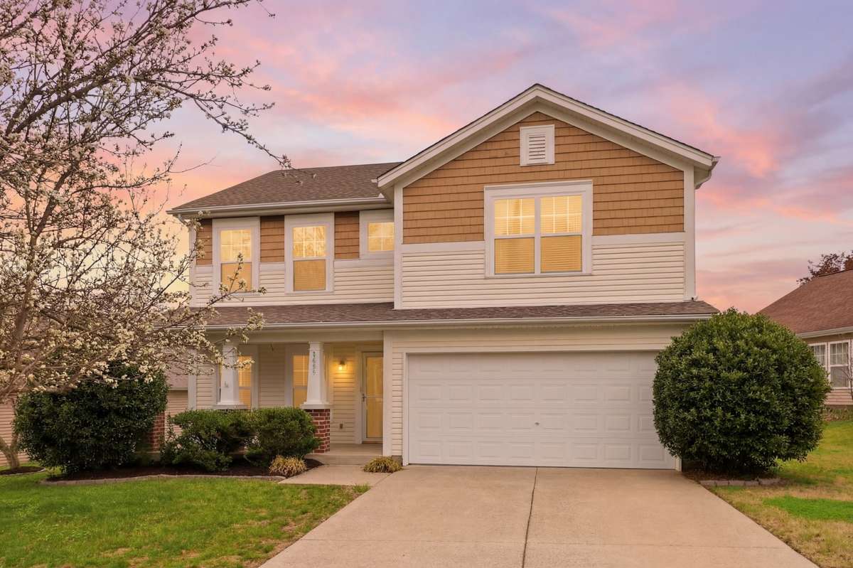 Twilight picture of this home is just beautiful.