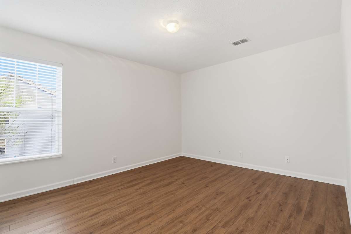 The 2nd guest bedroom has the LVP flooring as well