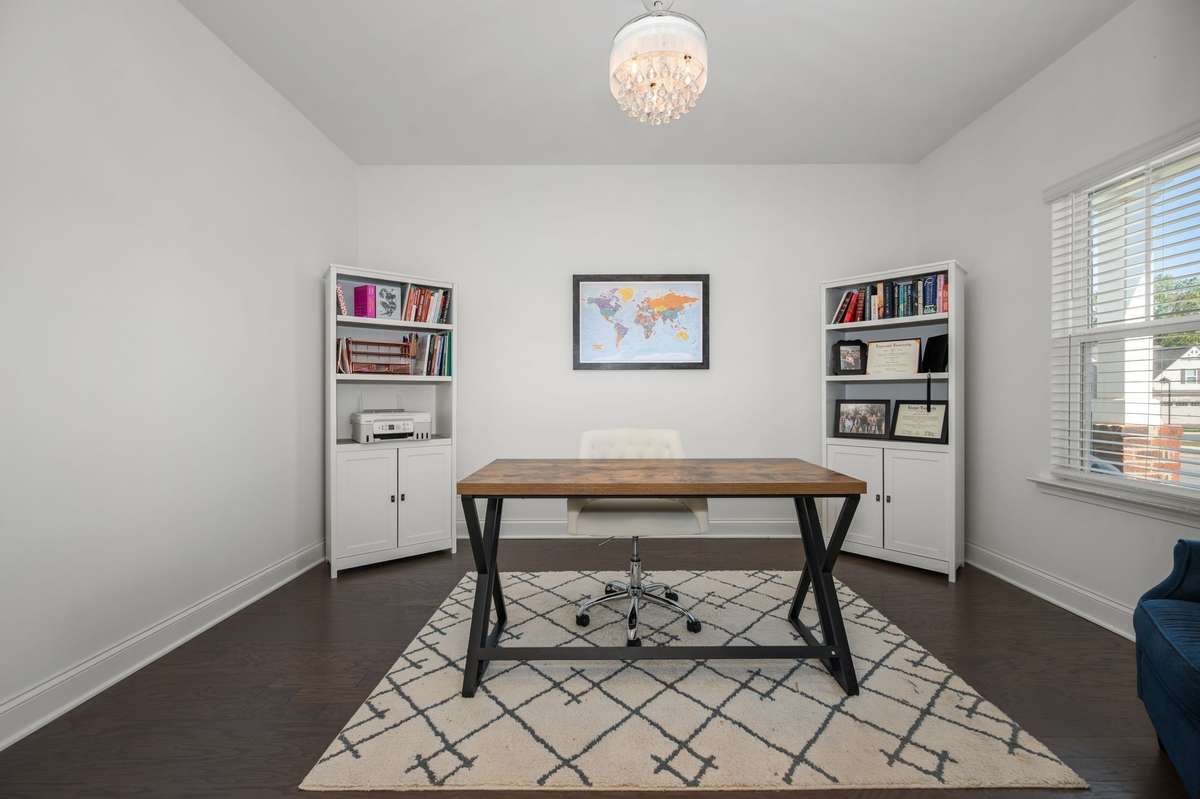 Dedicated office on the main level featuring french doors! Could double as a sleeping space/4th bedroom for guests.