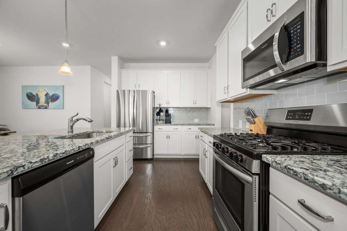 Gas range! Plenty of counter space and cabinets for storage!