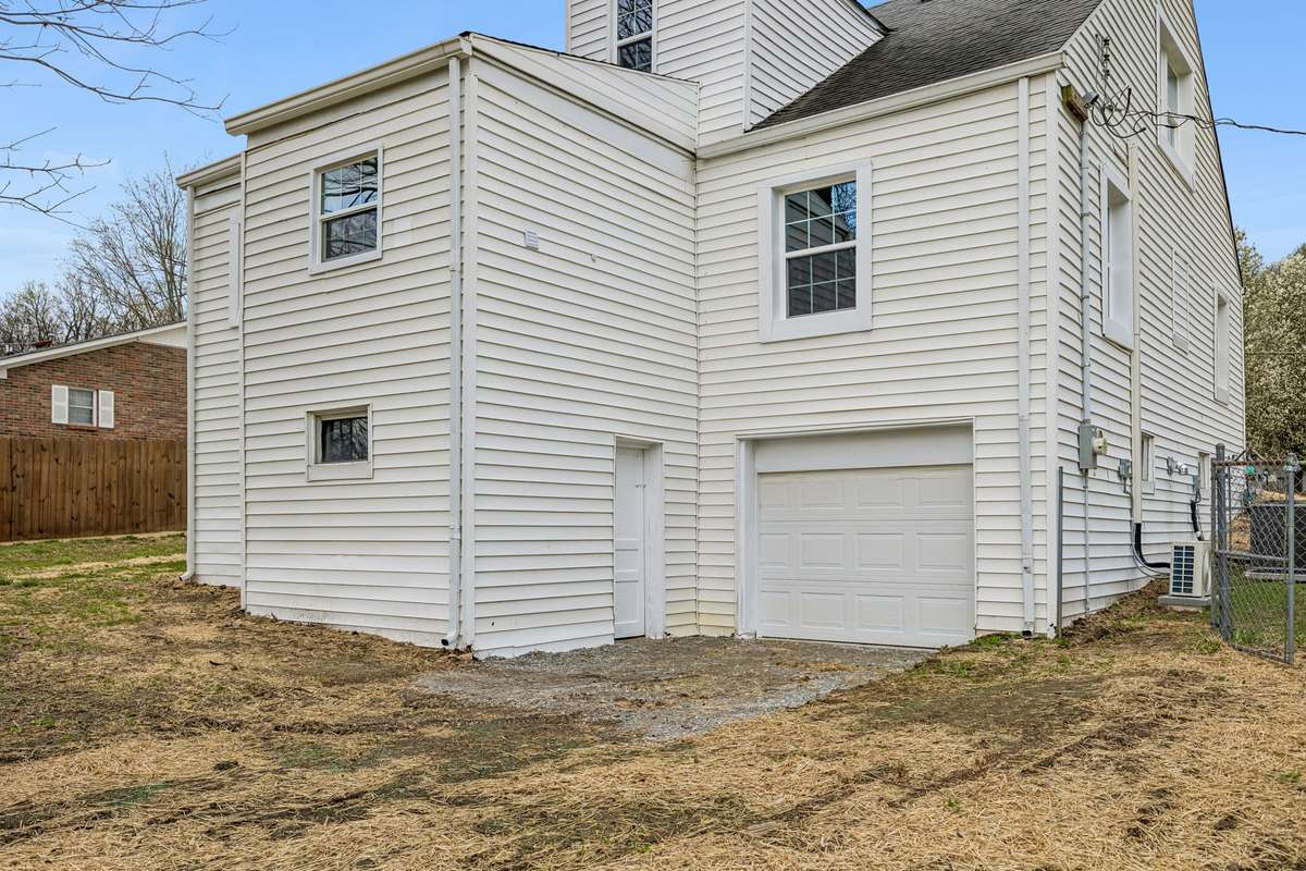 Garage door to basement for ease of storage.  Extra enclosed storage room off the back of the house.