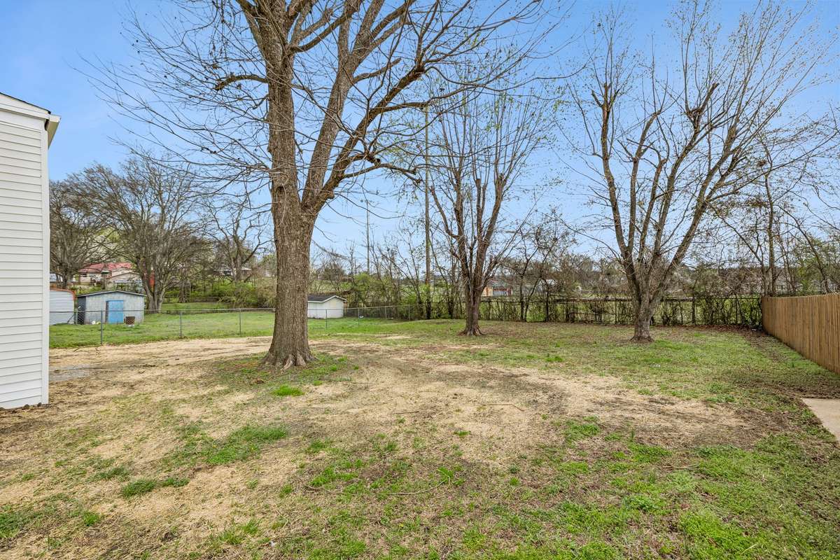 Large lot with mature trees backing up to a park!!