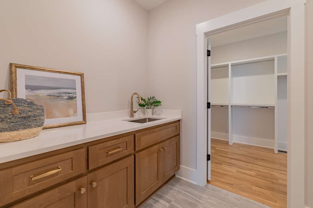View of the Laundry Room with Wash Sink off of the Primary Closet