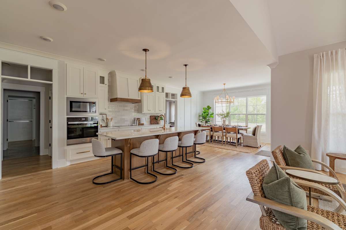Stunning Kitchen with Oversized Island with Visual Comfort Pendants