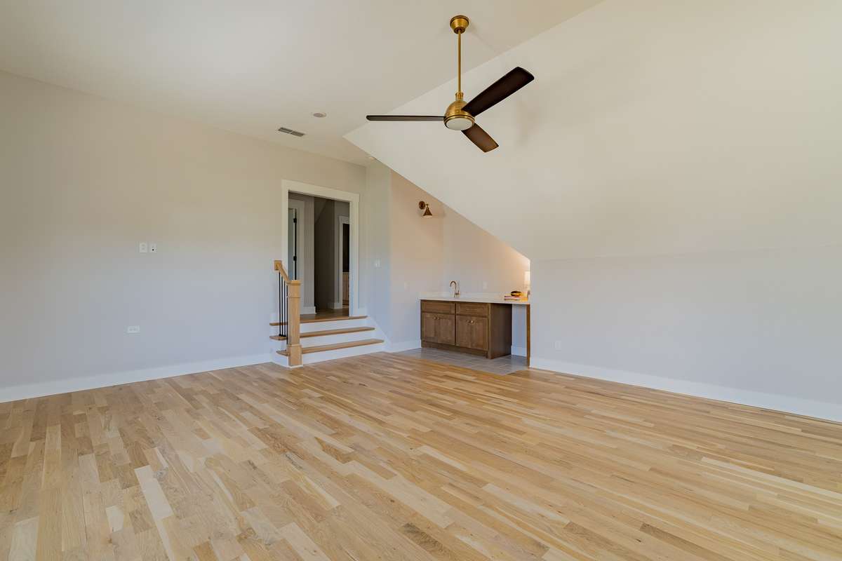 Upstairs Bonus Room has a Wet Bar, with Sink and Space for a Mini-Fridge
