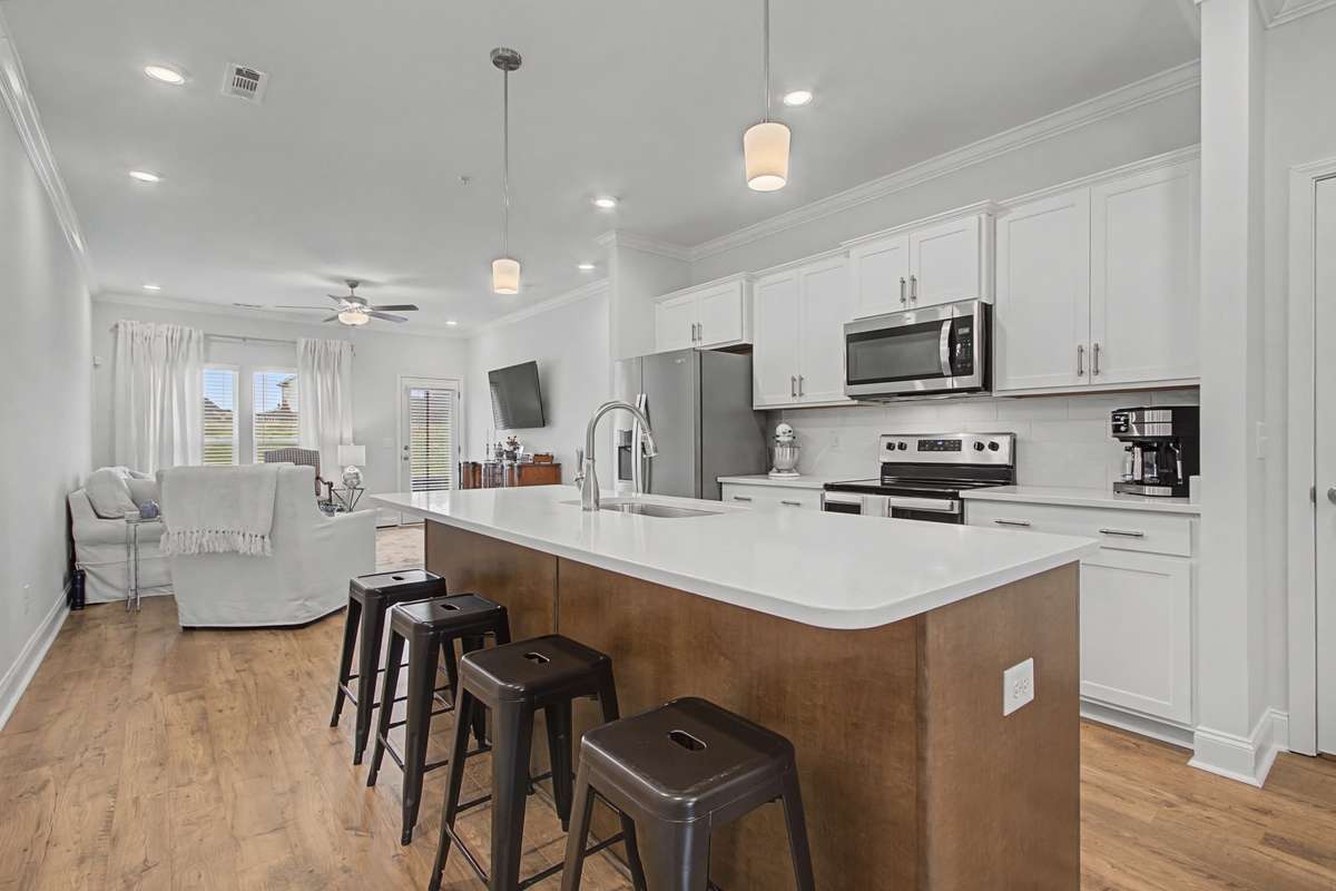 This open concept melds three rooms flawlessly - the dining room, kitchen and living room.