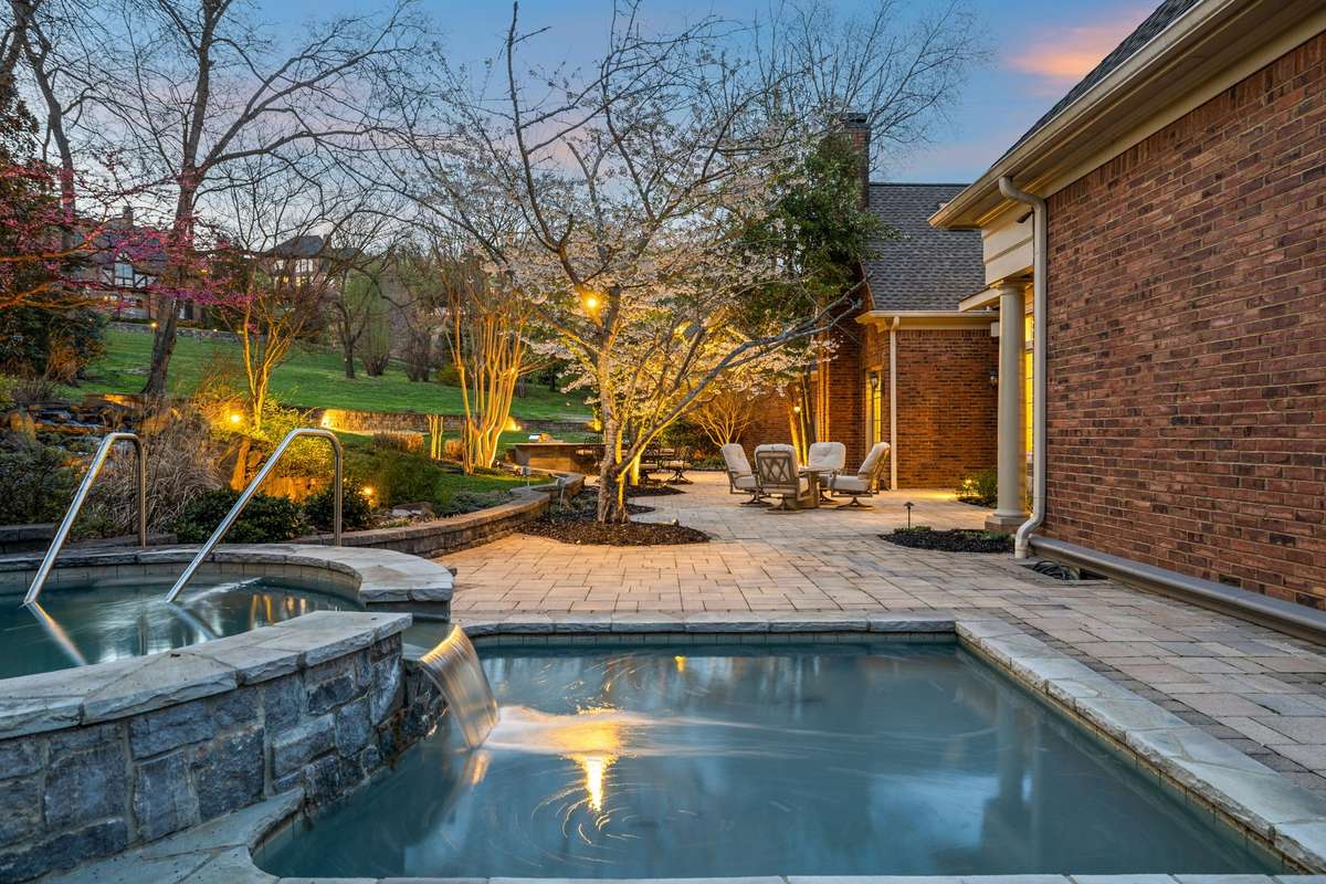 Resort-style spa with spillover feature