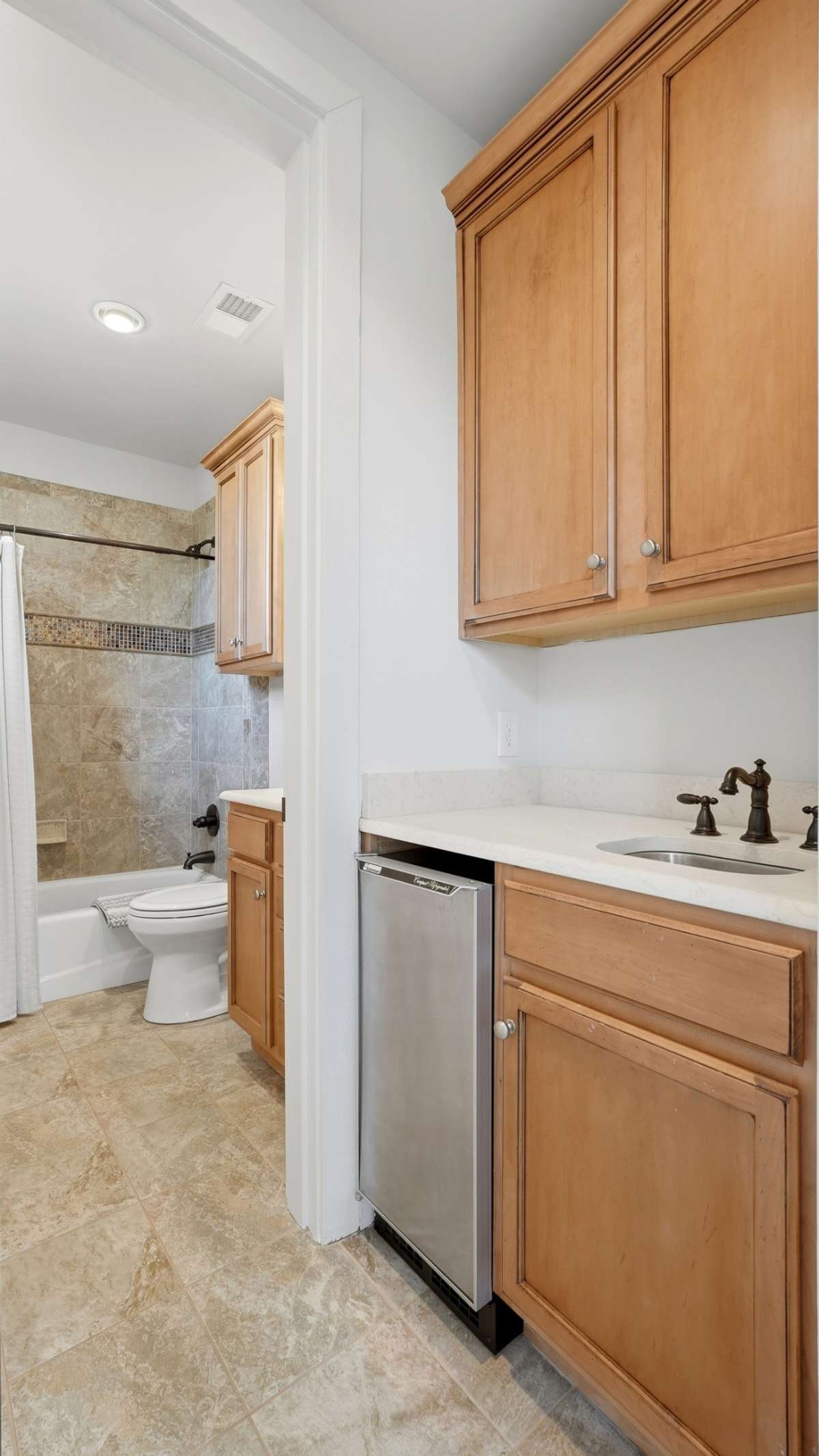 Bathroom and wet bar in rec room
