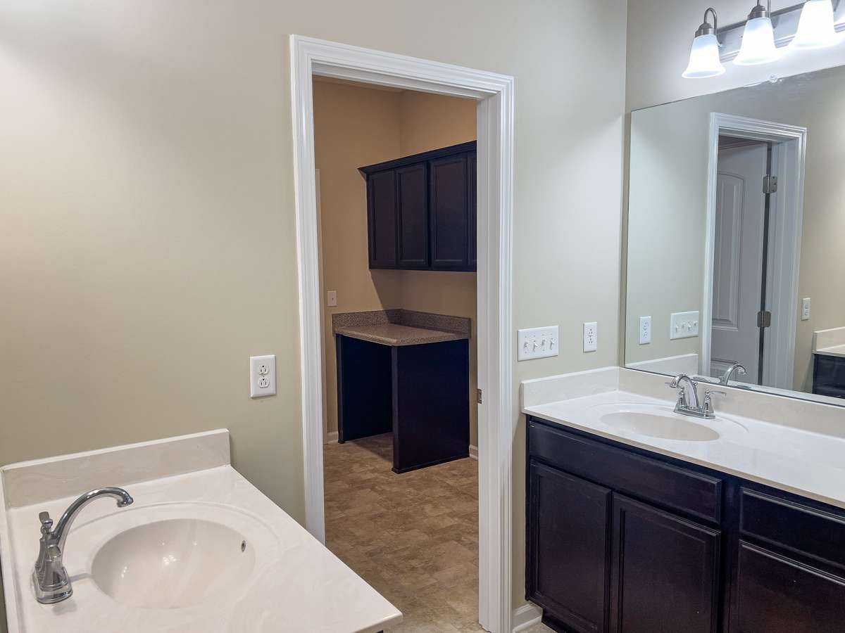 Primary bath attached to laundry room