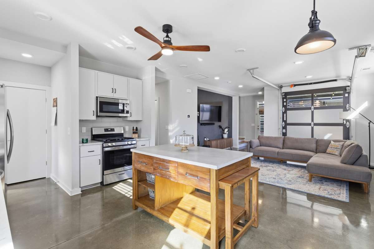 garage door opens up to covered patio for indoor/outdoor living