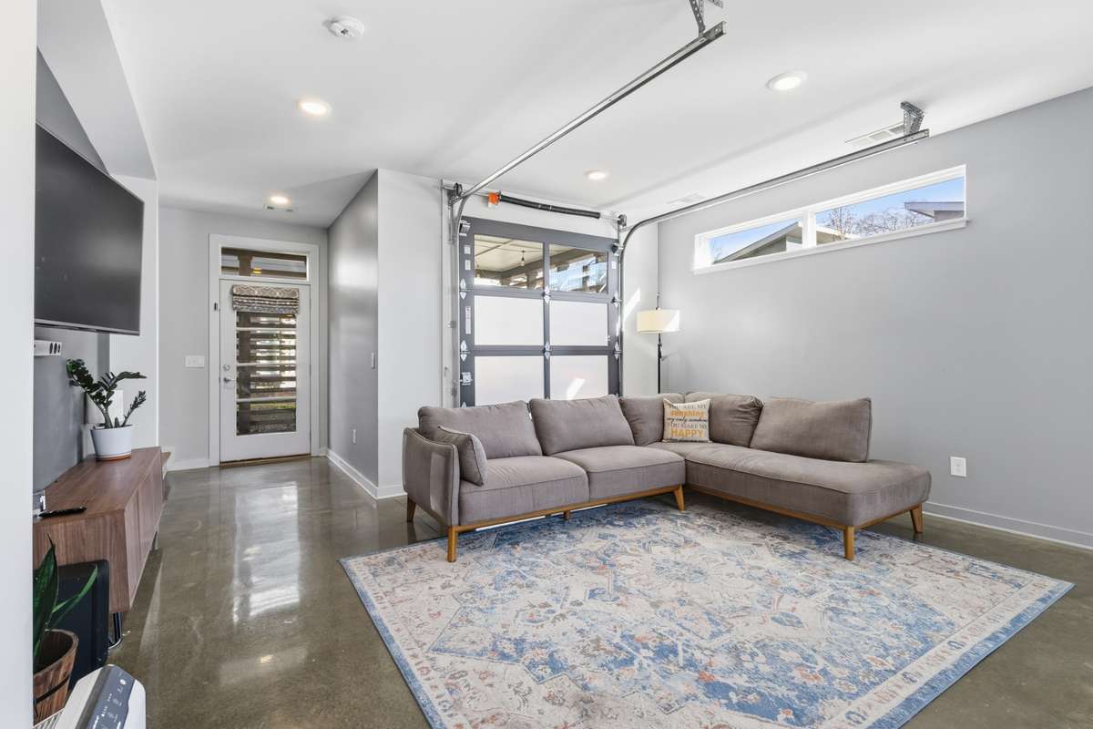 garage door opens up to covered patio for indoor/outdoor living