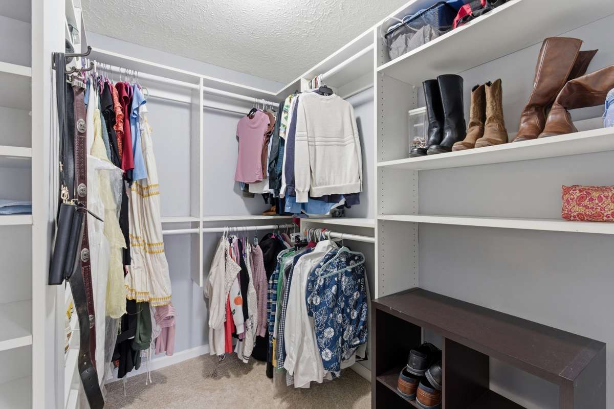 Primary walk-in closet.