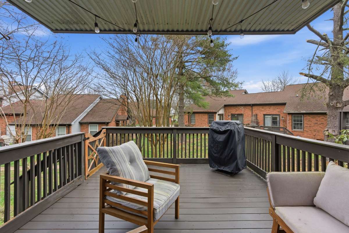 Downstairs partially covered deck from living room.