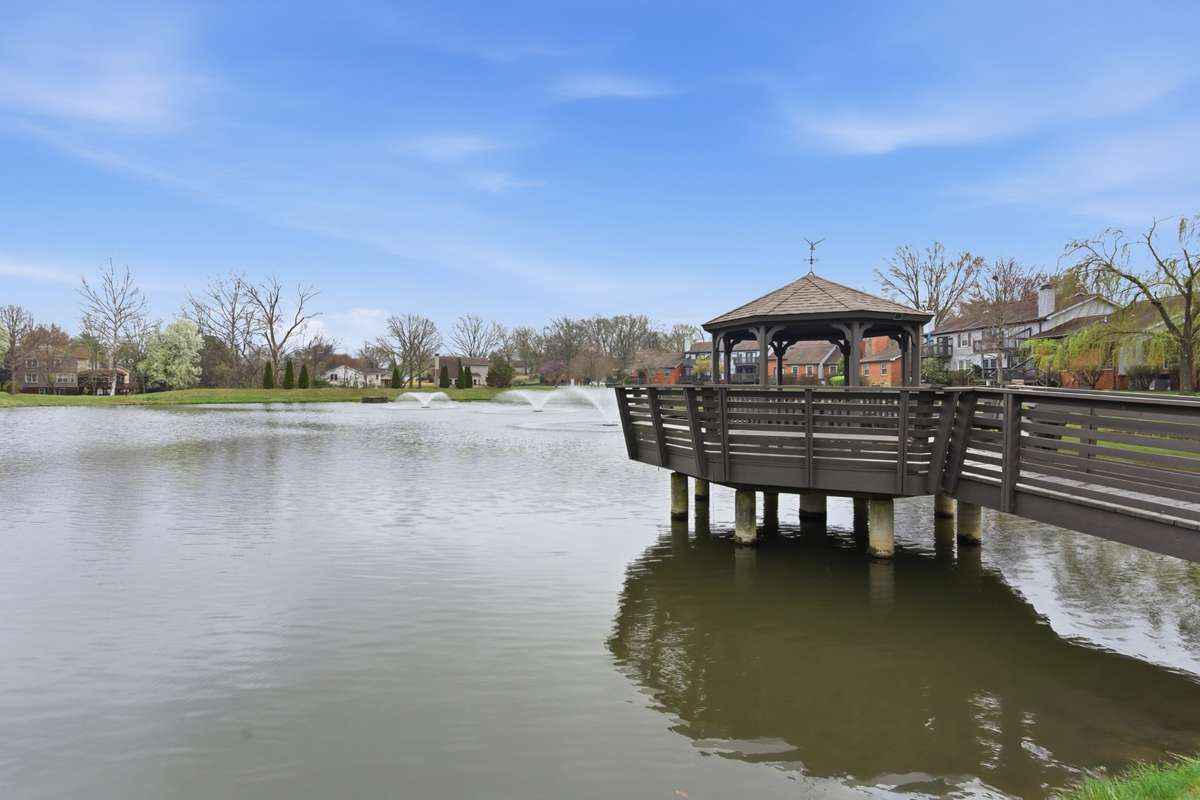 Hearthstone Village lake with gazebo sits in the center of the development.