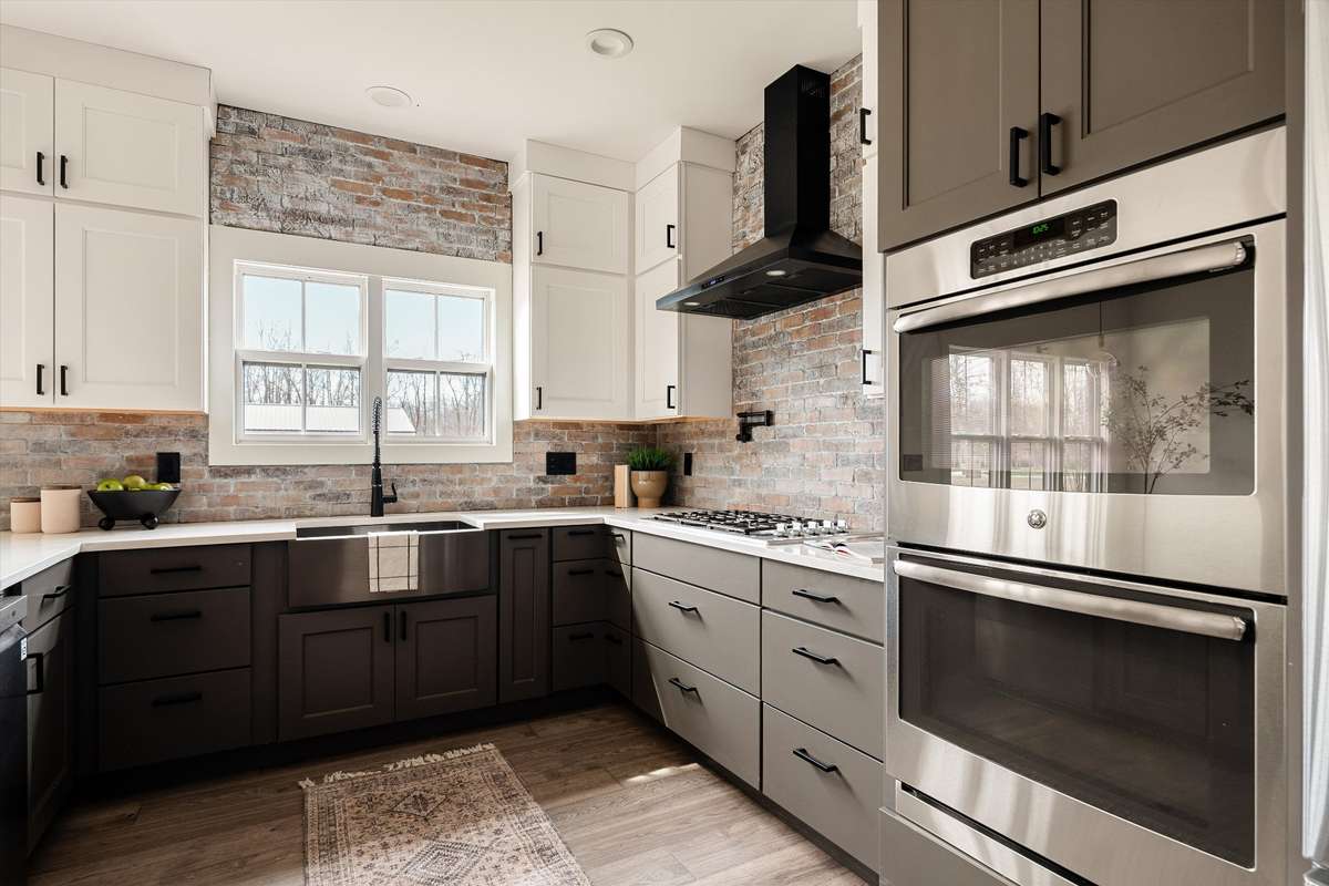 Beautiful Wellborn cabinets and quartz countertops