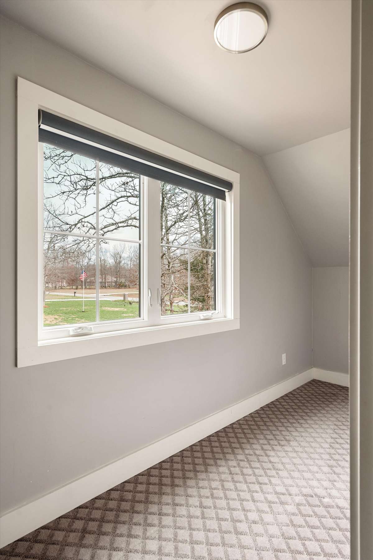 Massive walk in closet in bedroom 3 with a window
