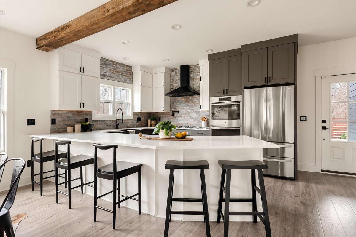 Large entertaining kitchen island that can comfortably fit 5 barstools