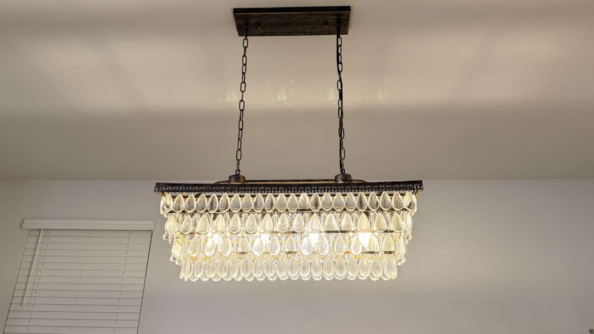 This beautiful Annabella Chandelier is color-changing (dimmer function as well) to match holidays, your favorite color, your moods. See next photo.