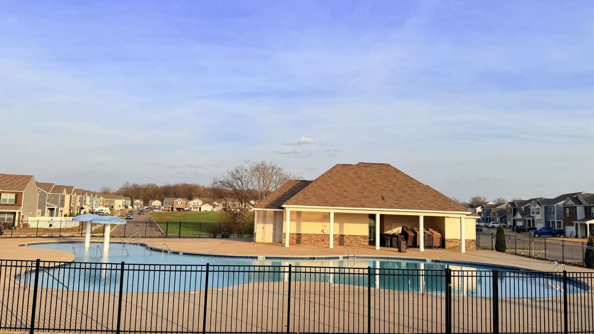 The large community pool (with a splash area) is a short walk from 5330 Owens Lane. The homes in the background on the right are on Owens Lane.