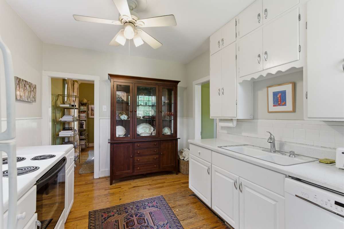 The kitchen easily accesses the living room and dining room.