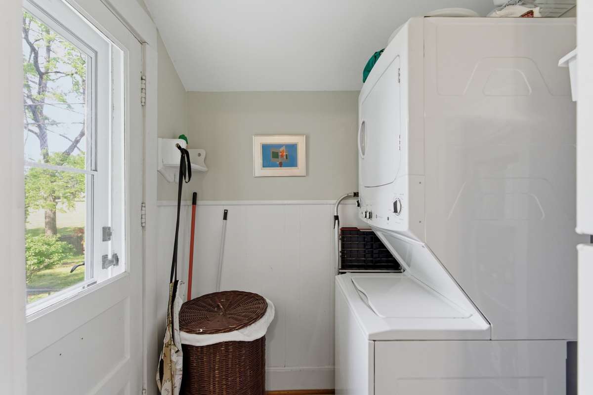 Utility room is located off of the kitchen