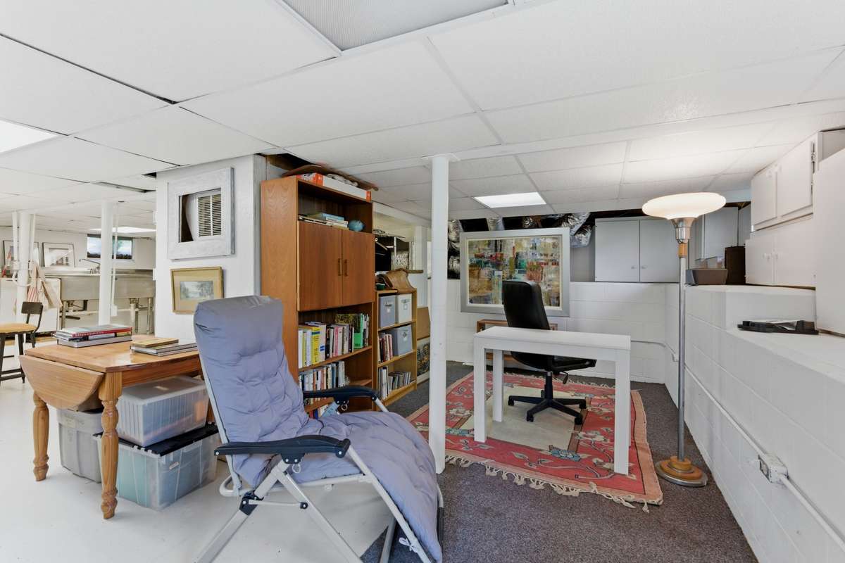Basement: The full basement has been used as a catering kitchen, a library, an office, and an artisan craft zone.
