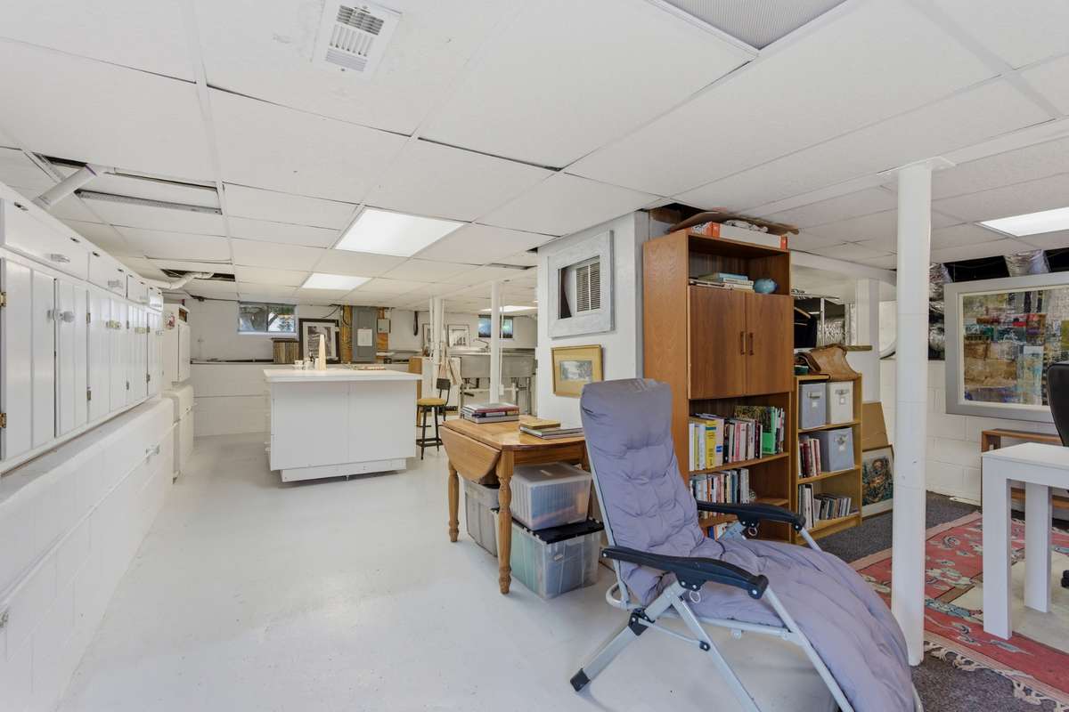 Basement: The full basement has been used as a catering kitchen, a library, an office, and an artisan craft zone.