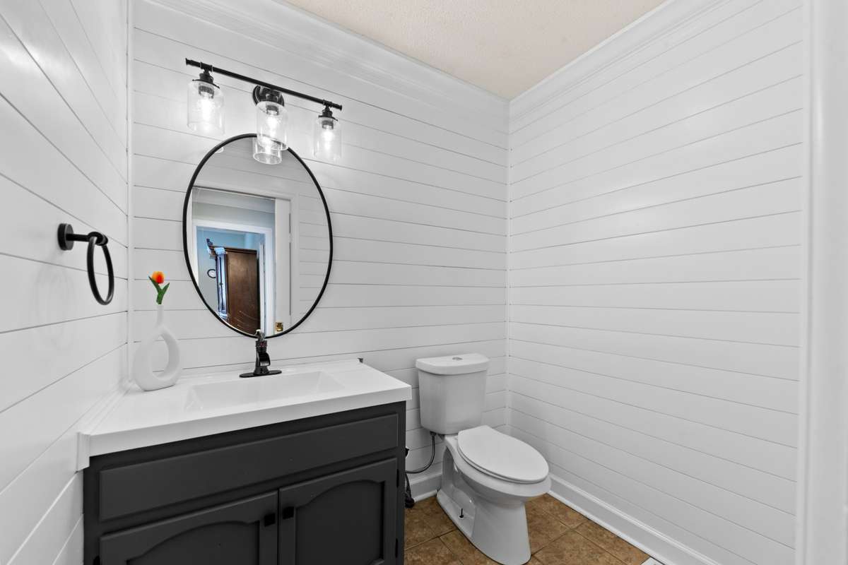 Half bath off the kitchen.