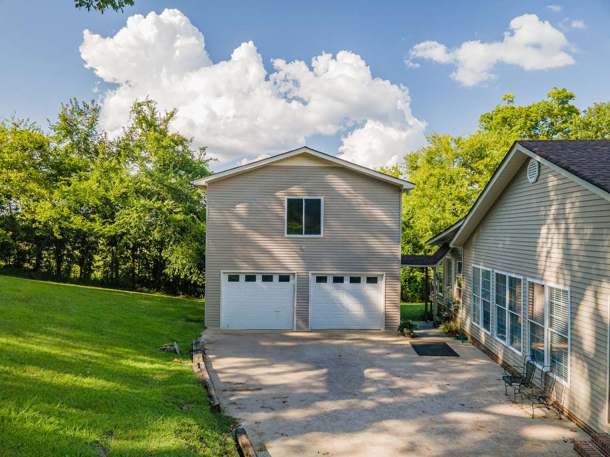 2 car garage with a bonus area