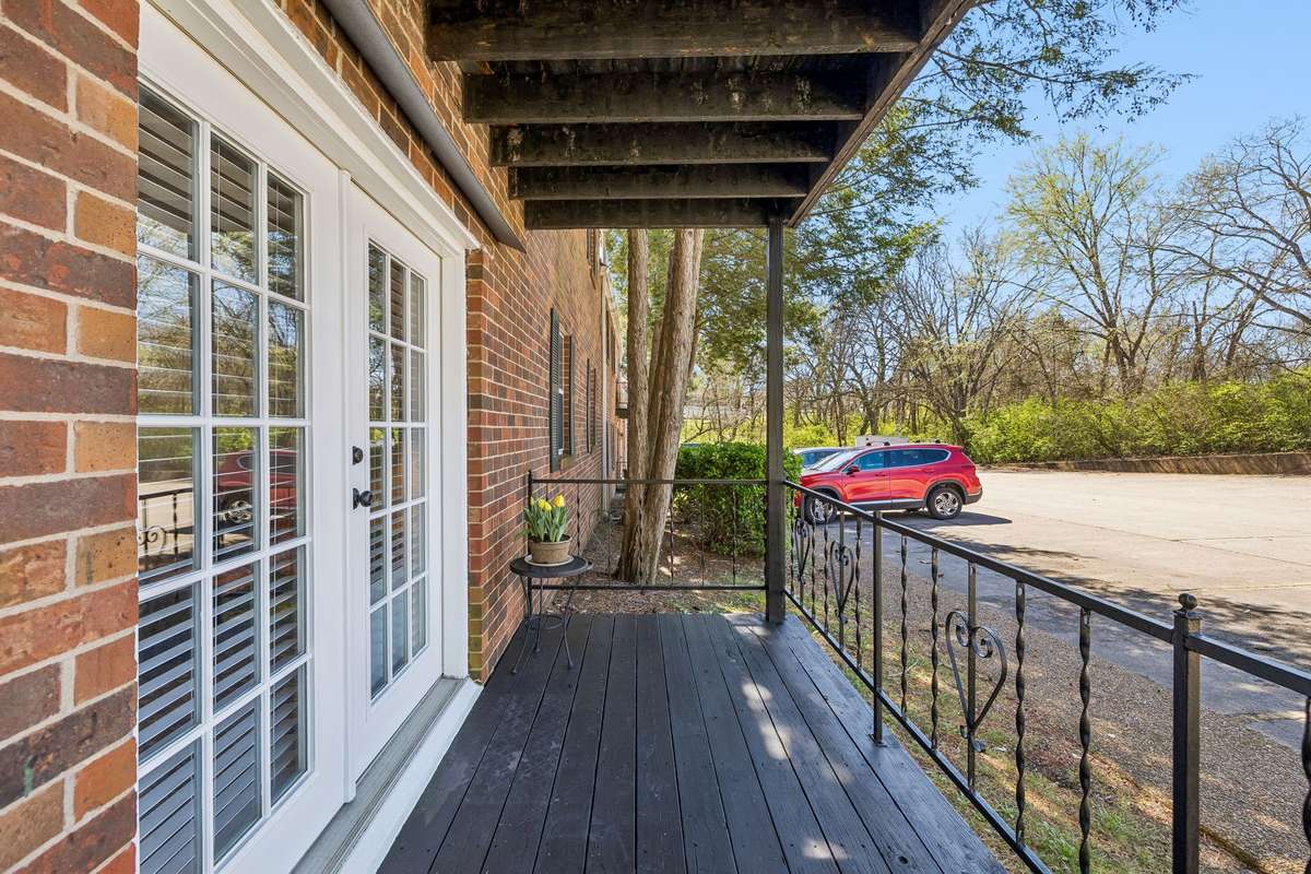 Covered deck with views of Jim Warren Park