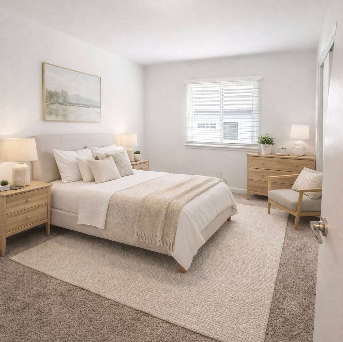 Bedroom one with blinds on window. Features two closets.