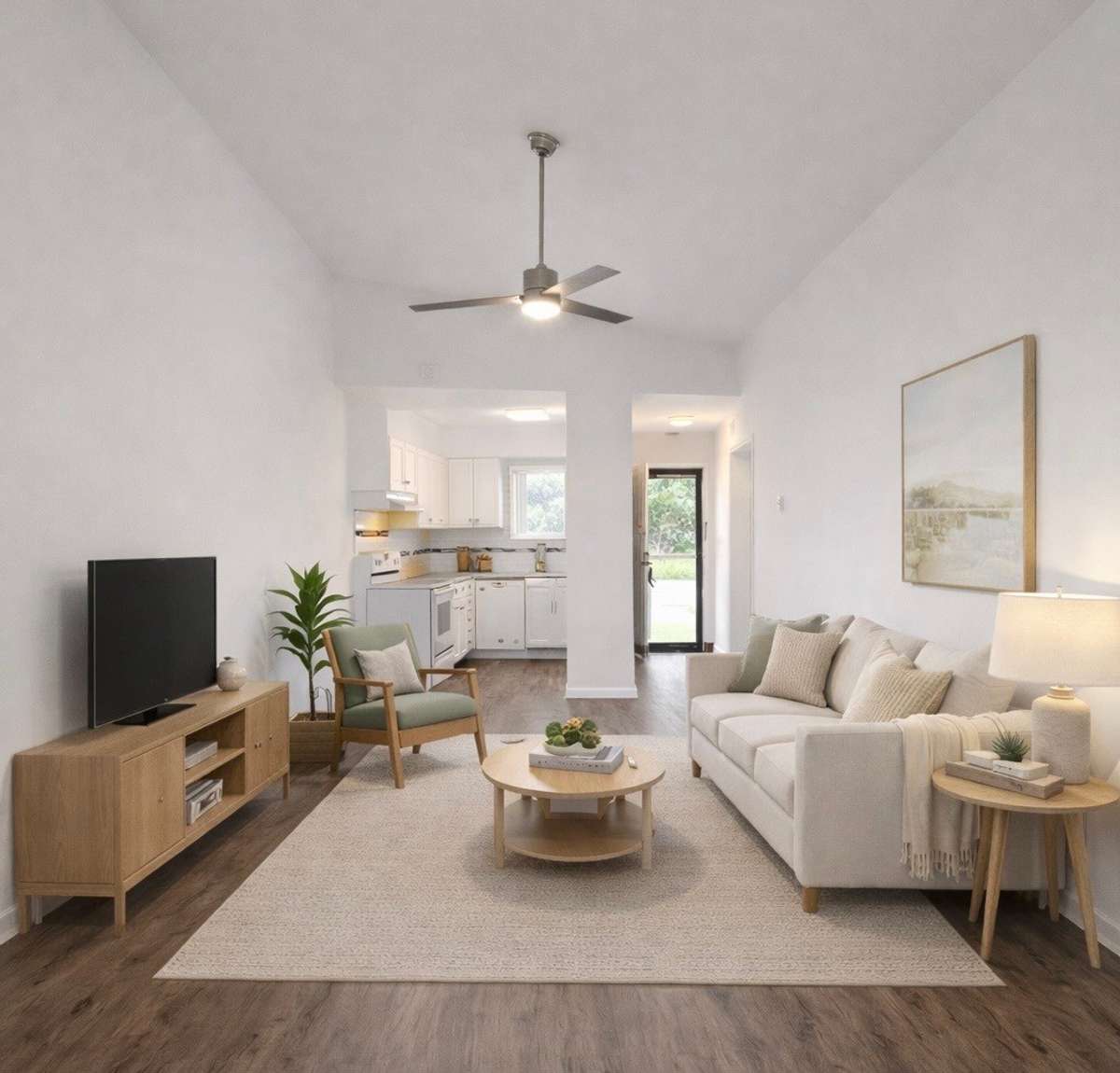 Living room open to cozy kitchen with dishwasher, oven and refrigerator, granite countertop and tile backsplash. Storm door on front entrance to let in more light when front door open. Hallway coat closet.