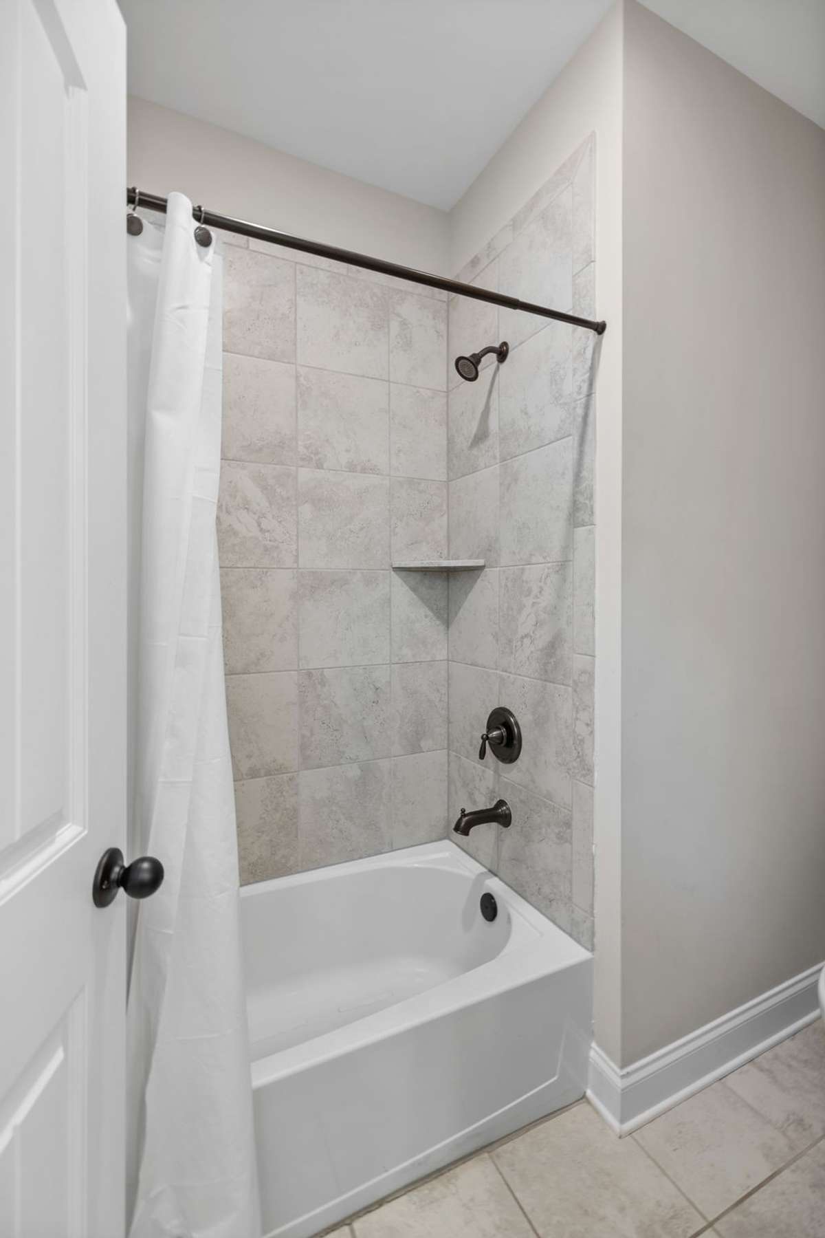 Second Bath/Shower combo and water closet.  Combines convenience and privacy.