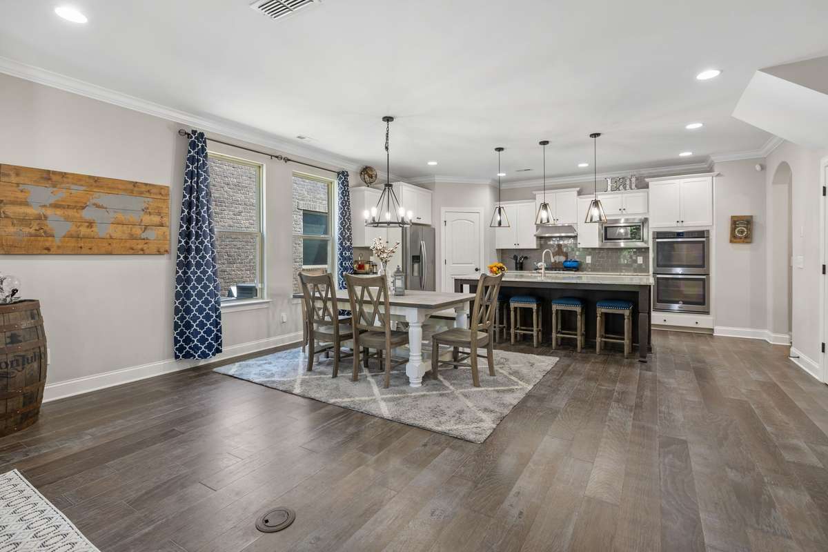 Open concept dining between the living room and Kitchen.
