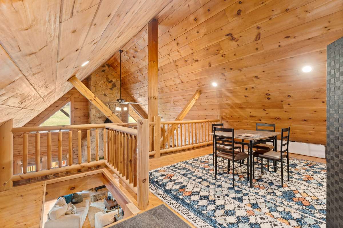 Upstairs loft can function as an office, a yoga and fitness area, craft room, hobby and safe storage and more.