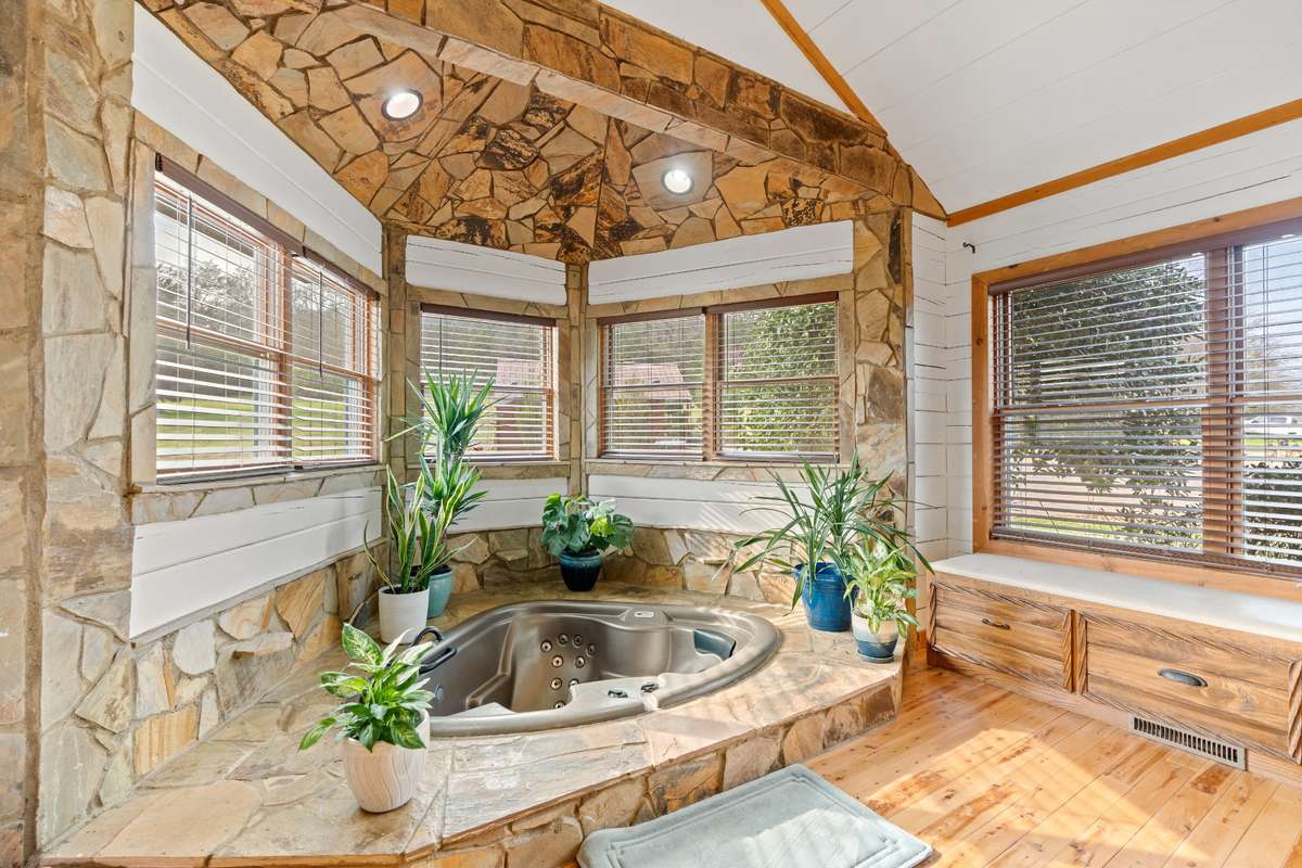 Jacuzzi tub oasis and built ins providing additional storage