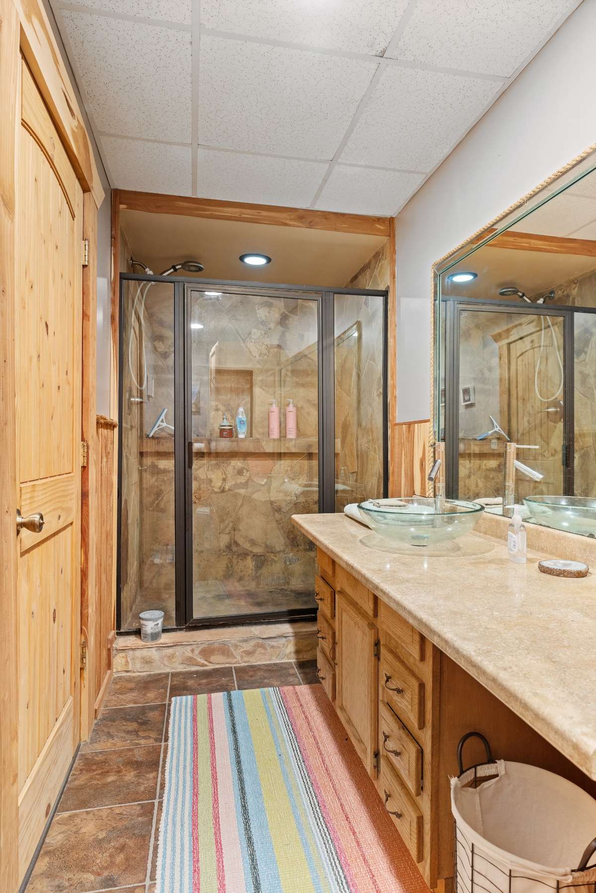 Walk in shower and plenty of storage and counter space.