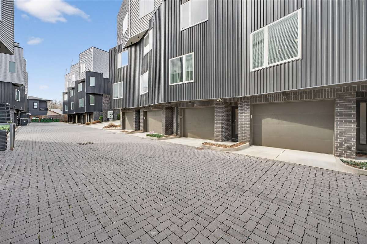 Step into a quiet, private alleyway—your easy access to the garage and a serene escape in the heart of Nashville.