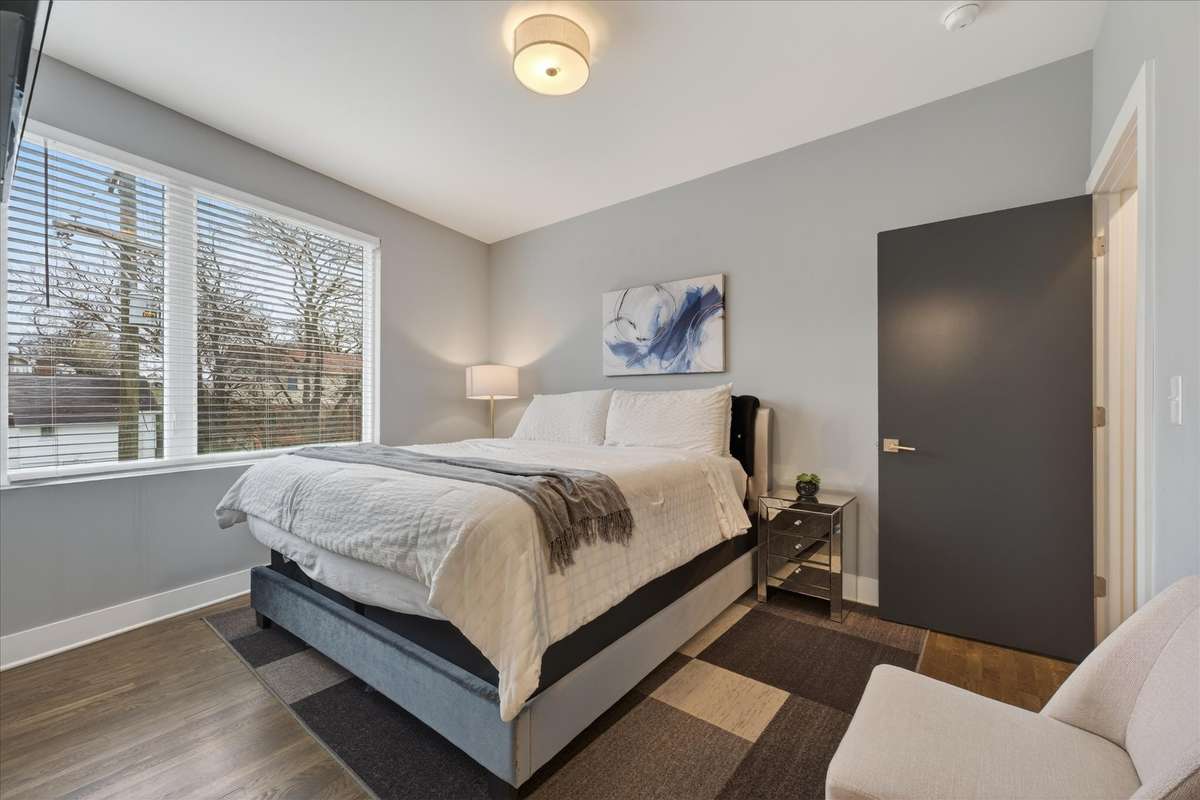 Bedroom 3 serves as a spacious private suite, offering a relaxing retreat with stylish furnishings and plenty of room to recharge after a day exploring Nashville.