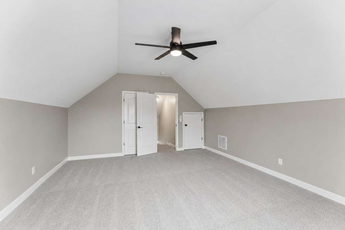 Freshly painted bonus room  with new carpet with access to walk out attic storage! 1012 Rudder Drive, Spring Hill, TN 37174