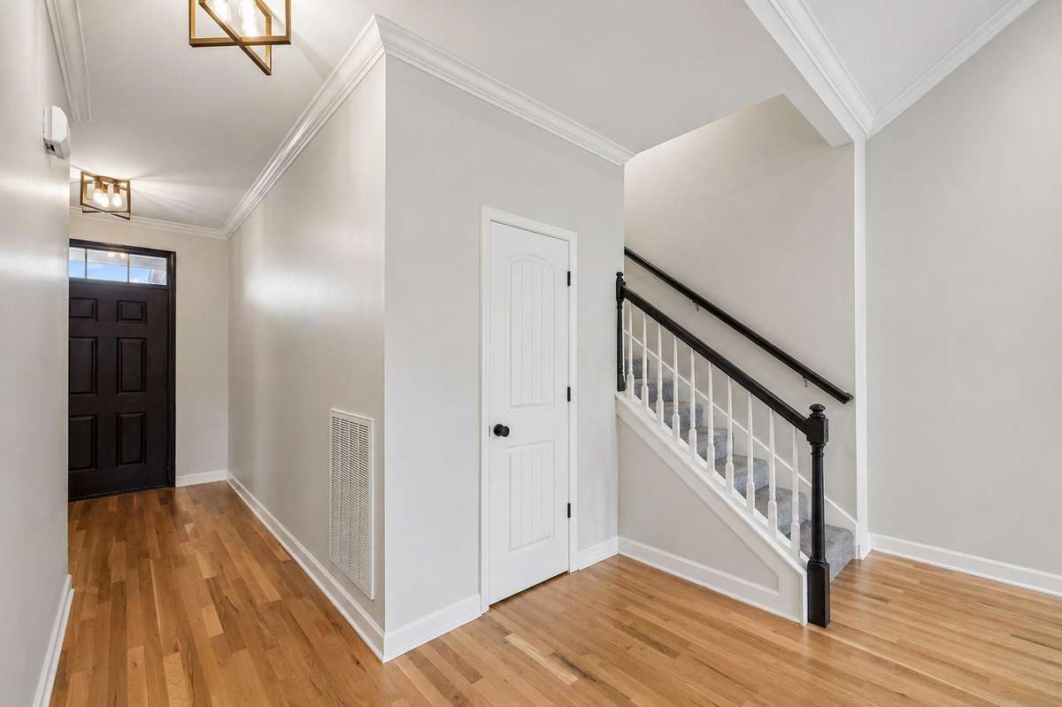 Another view of your living room with hardwood flooring & neutral color scheme. 1012 Rudder Drive, Spring Hill, TN 37174