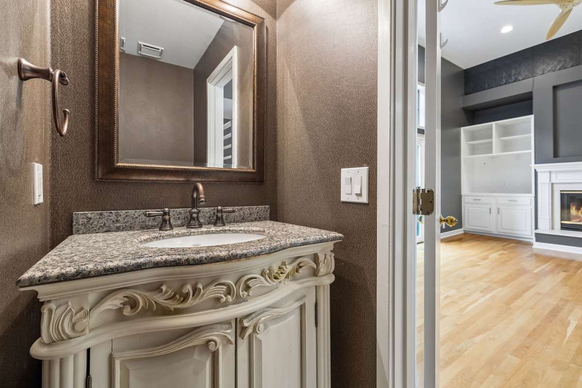 Updates 1/2 bath only steps away from you living area!