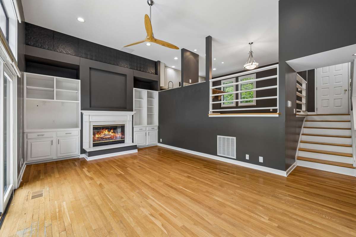 Open livingroom with wood buring fireplace!