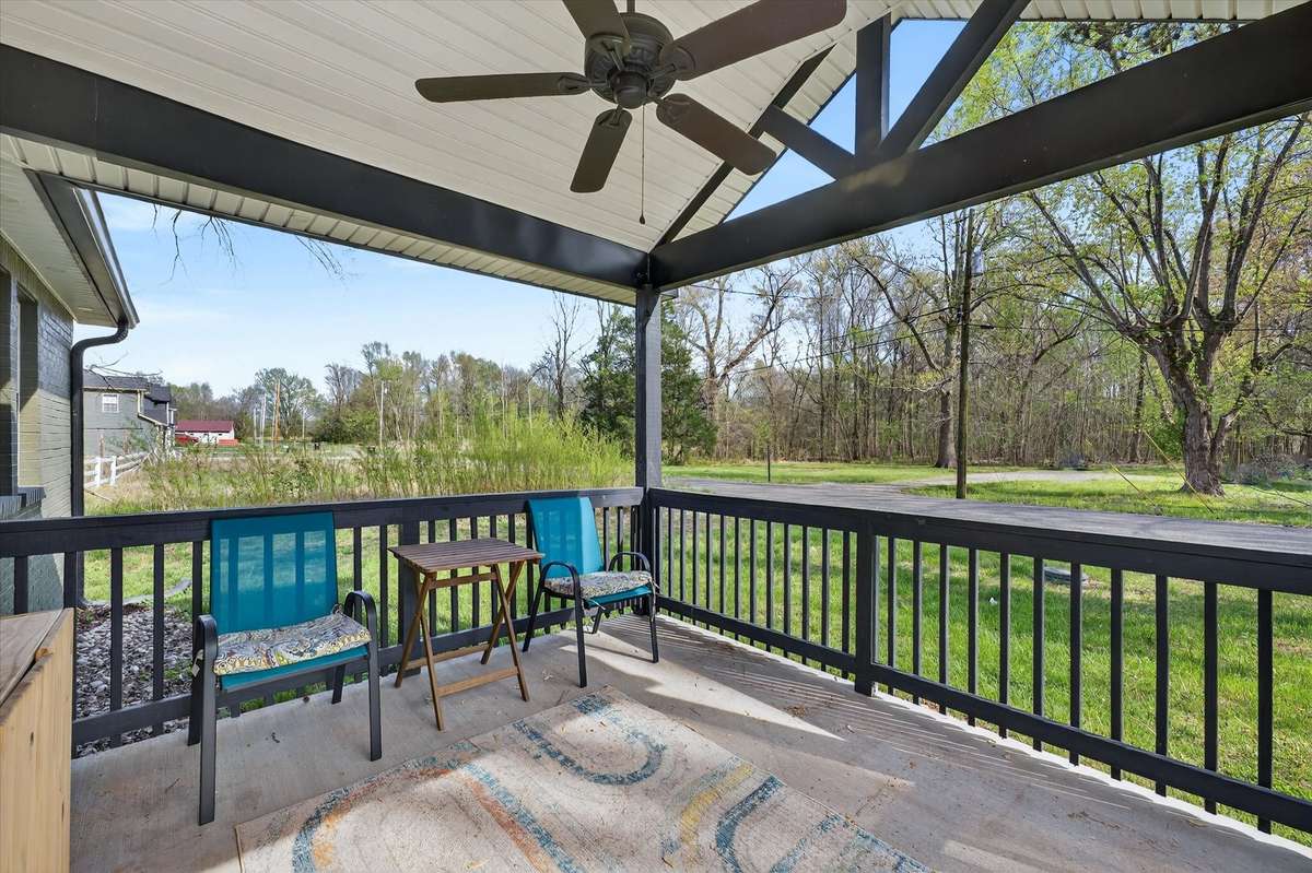 Sip your morning coffee on this Gable covered porch with a ceiling fan and recessed lighting