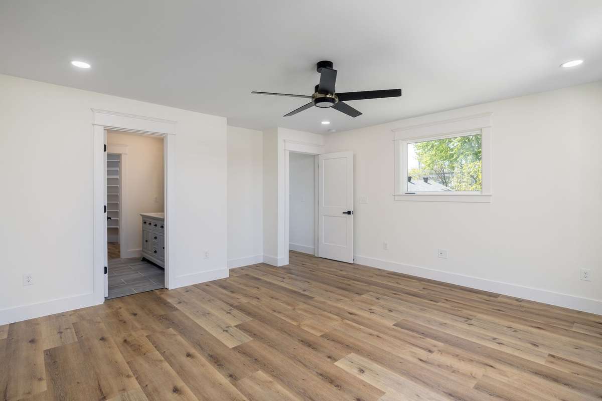 Primary spacious bedroom with en suite bath.