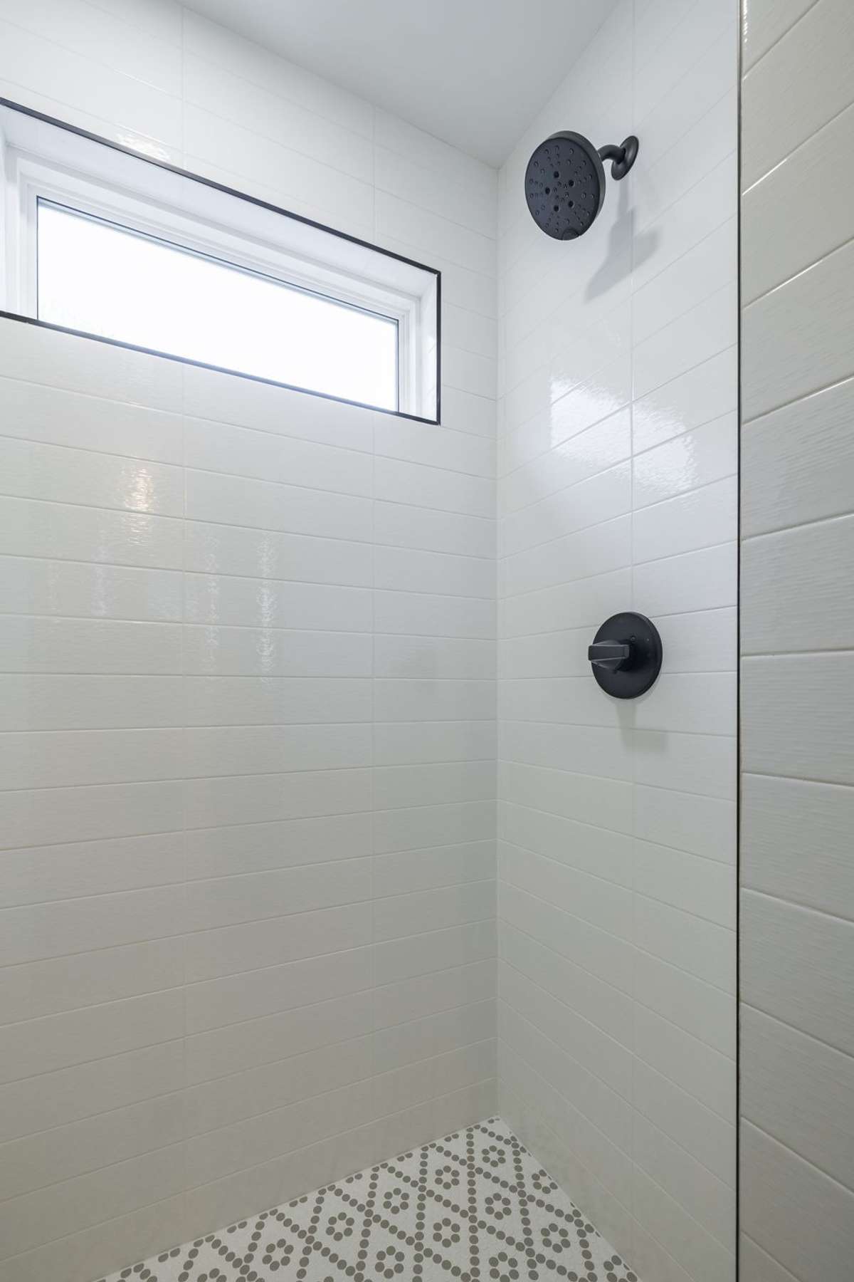 En suite bath offers double sinks, walk in shower, and large walk in closet.