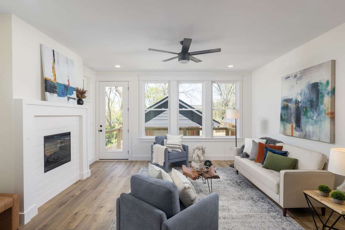 Large living area with fireplace and room sofa or sectional