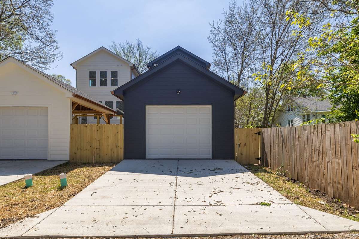 Garage door and a parking pad for more parking options